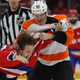 Nicolas Aube-Kubel subdues former Capitals forward Brendan Leipsic with a Vulcan nerve pinch in this photo from February.